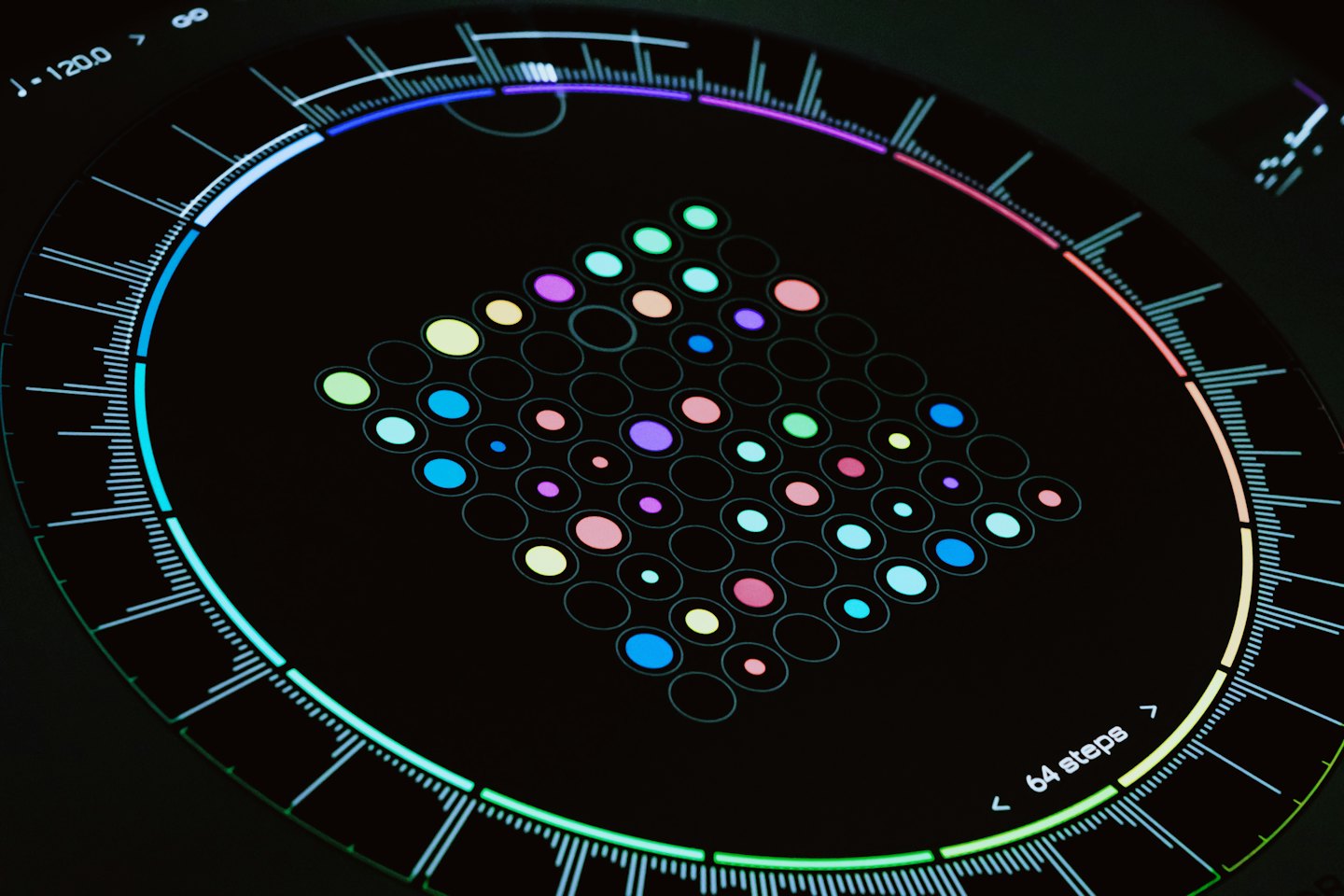 Digital interface screen shows colorful circular progress bar and grid.